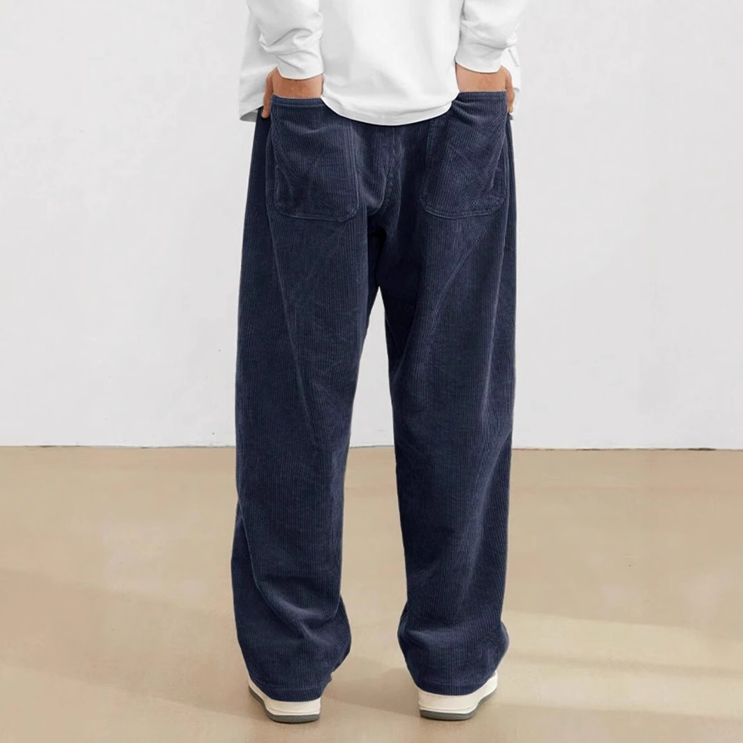Wide leg trousers shown on model