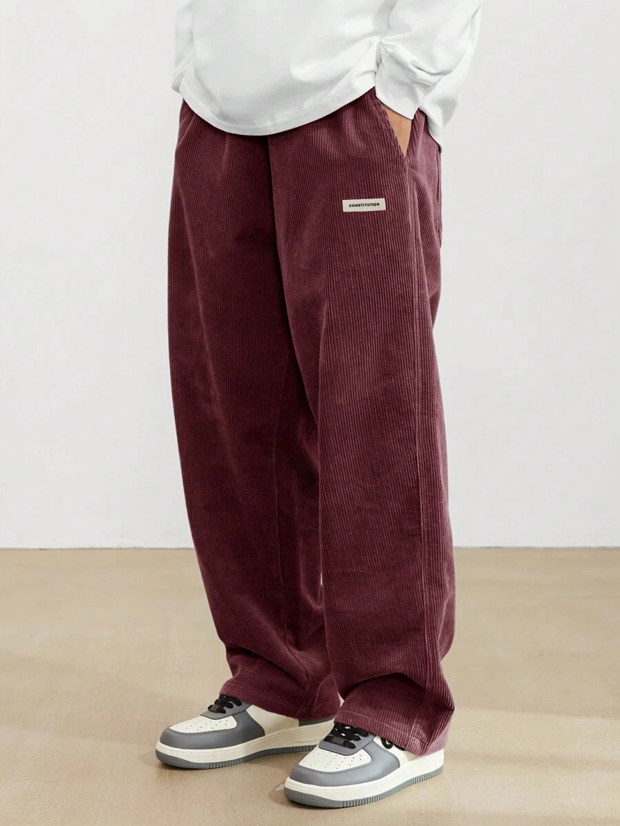 Men's wide leg draped trousers front view